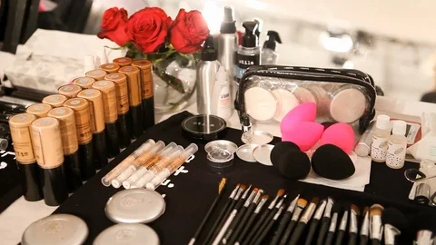 Make products and tools set up nicely on a table backstage at a fashion Stock-Footage 101223861