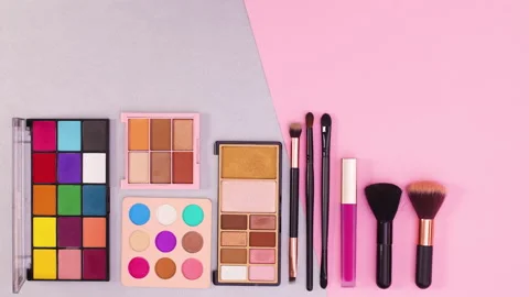 Make up products ordering on the bottom of silver pink theme. Stop motion Stock Footage 145111955