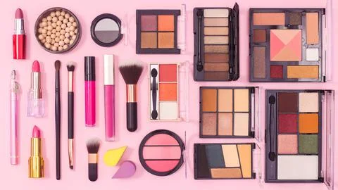 Make up products pattern on pink background. Flat lay Stock Photos