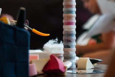 Make-up products variety on a table. Stock Photos
