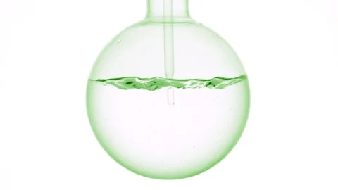 Make-up remover dropper injection swirls and bubbles in flask Stock Footage 339380387