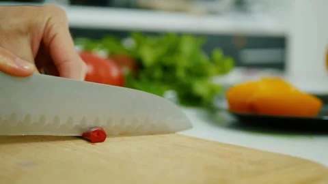 Make salads in the home kitchen chop and cook healthy meals at home on the keto 스톡 동영상 334644088