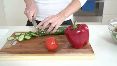 Make salads in the home kitchen chop and cook healthy meals at home on the keto 스톡 동영상 334644177