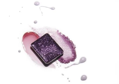 Make up samples for eyeshadow and lip gloss. Stock Photos