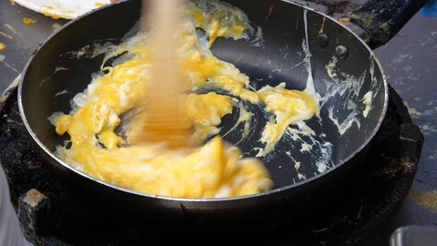 Make scrambled eggs, helthy and cooking concept. Stock Footage 104437436