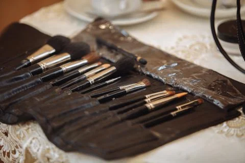 Make up set, Professional makeup brushes in tube. Dirty makeup tools, soft Stockfoto's