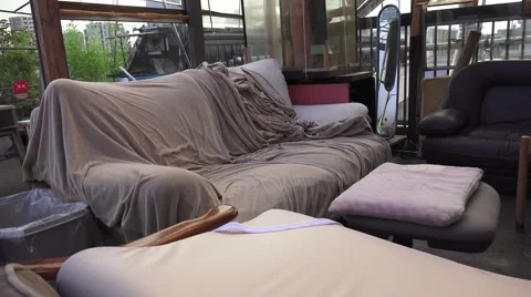 Make Shift And Messy Lounge Living Room Area With Sofas Video stock 51167968