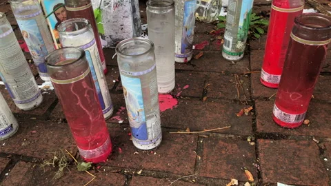 A Make Shift Memorial Shrine in a Schoolyard for Teenager That Died. Stock Footage 169330573
