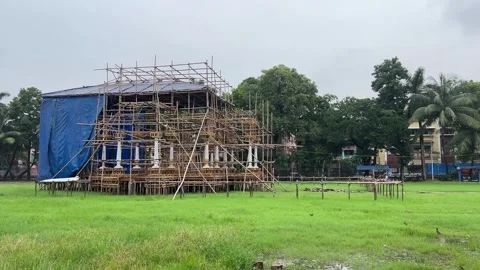 Make shift pandal being constructed for Durga Puja Stock Footage 282883776