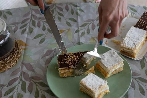 Make slices of cake Stock Photos