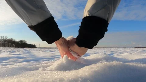 Make snowball in the winter landscape that is covered with snow. Stock Footage 148239376