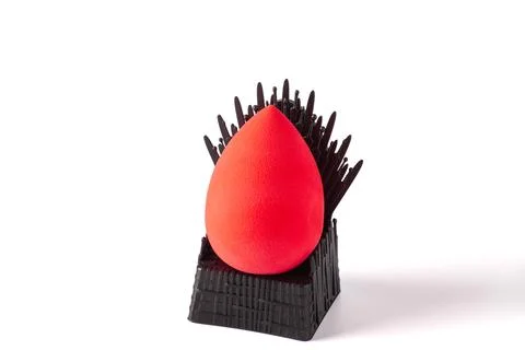 Make up sponge on black stand isolated on white background Stock Photos