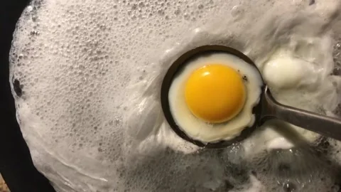 Make sunny side up eggs in a unique and perfect way Stock Footage 228778782