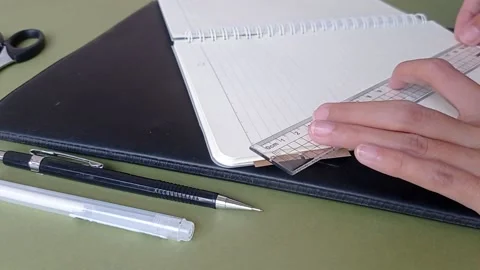 Make a table on the journal book Stock Footage 150523455