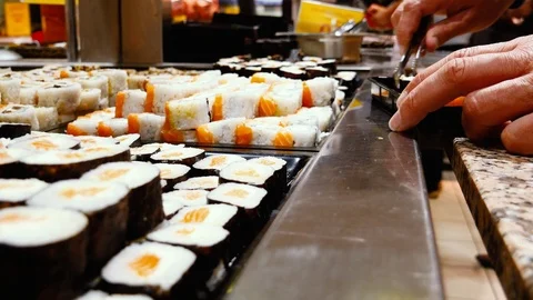 Make taking sushi form food bar, take out food Stock Footage 112074433