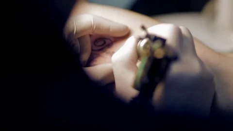 Make a tattoo on his arm Stock-Footage 74202488