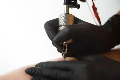 Make a tattoo macro shot of a hand Stock Photos