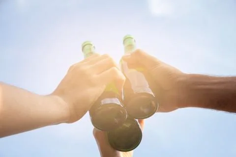 Make a toast with bottles Stock Photos