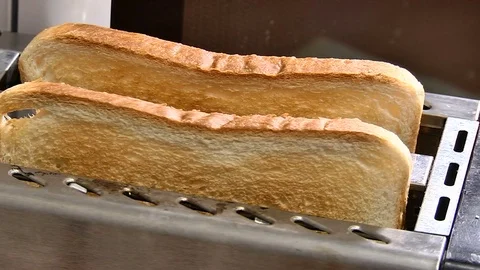 Make toast in the toaster Stock Footage 72845555