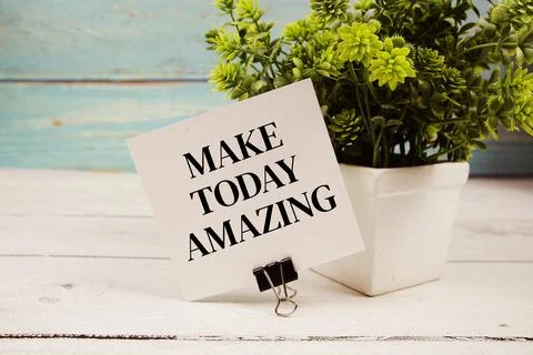Make Today Amazing text written on paper card on wooden background Stockfoto's
