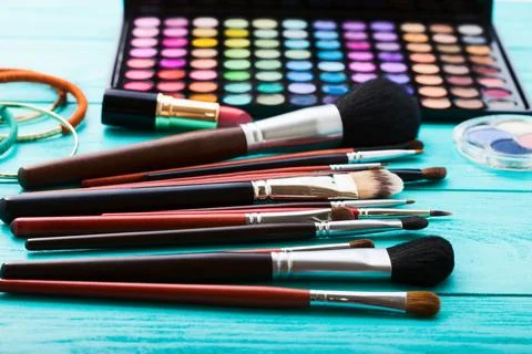 Make-up tools. Make up products. Lipstick, eye shadow, brushes. Cosmetics o.. Stock Photos