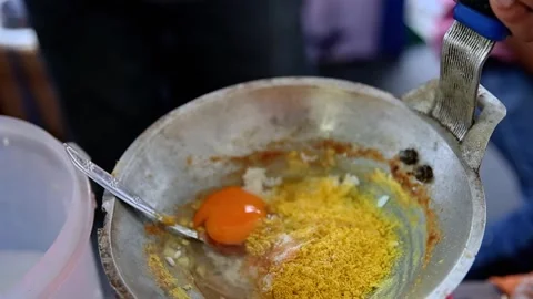 Make the typical Betawi egg crust Stock Footage 268515743