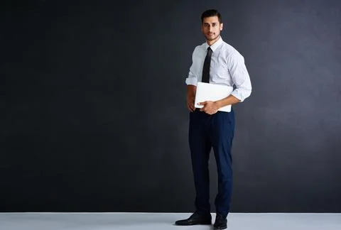 Make way for the next CEO. Studio portrait of a young businessman standing ag 스톡 사진