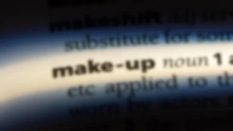 Make-up word in a dictionary. Stock Footage 99563255