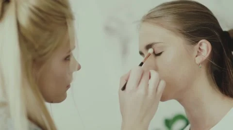Make-up work. Make-up artist and model Stock Footage 68041265
