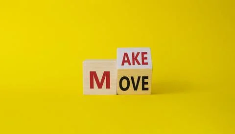 Make your Move symbol. Turned wooden cubes with words Make Move. Beautiful .. Stock Photos