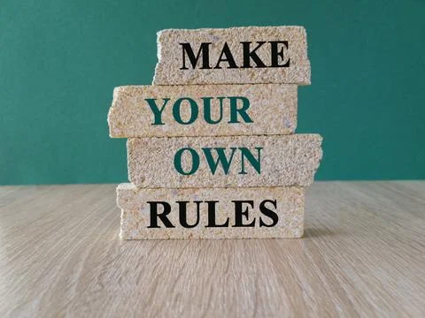 Make your own rules symbol. Concept green words Make your own rules Stock Photos