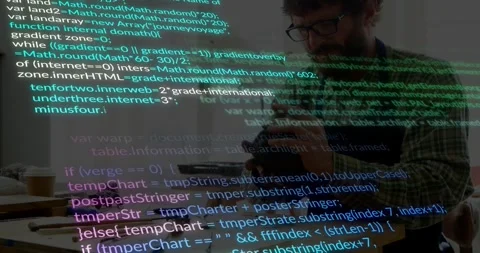 Maker picking up part, rotating and testing on bench while code overlay showing Stock Footage 333830356