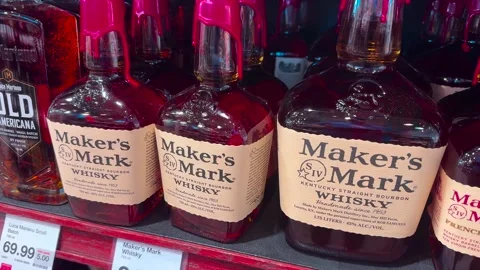 Maker's Mark Whisky bottles on store Shelf - Three Bottles Stock Footage 250403534