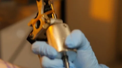 Makes a beautiful tattoo in the studio, slow shooting Stock Footage 103180290
