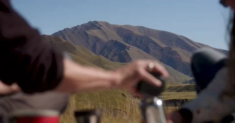 Makes coffee picnic in the mountains Video stock 232138312