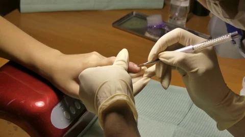 The makes manicure gel lacquer Stock Footage 79329359