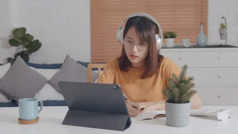 Makes Video call learning online Course , working from home Stock Footage 128188276