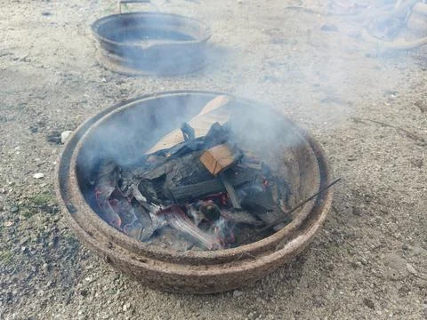 A makeshift outdoor fire pit Stock Photos