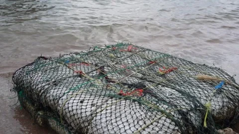 Makeshift raft floating platform made from foam for fisherman in the sea Stock Footage 258755885