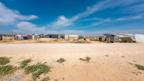 Makeshift Settlement Under Blue Sky Stock Photos