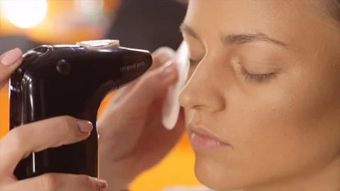 Makeup airbrush. make-up artist doing models makeup. atomizer Stock Footage 87518099