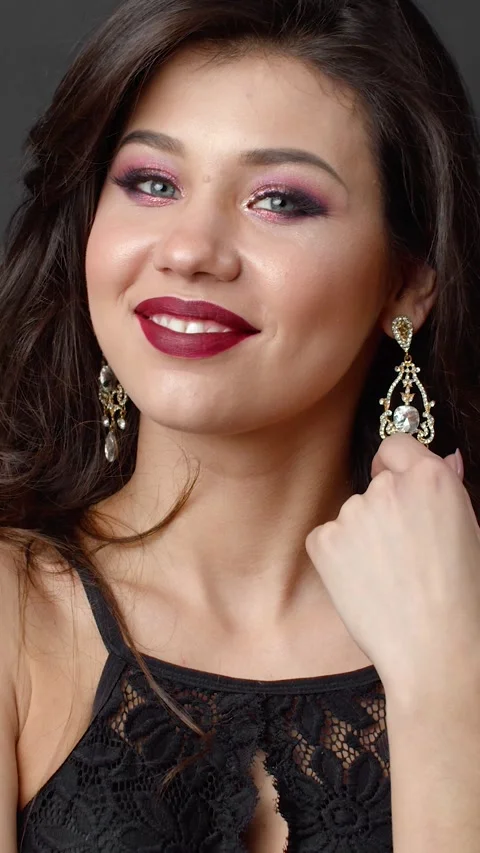 Makeup and Smiles in a Studio Stock Footage 322690467