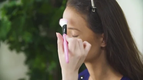 Makeup applied to the face model Stock Footage 73106586