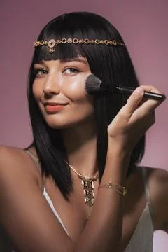 Makeup Apply by Brush. Cleopatra Style Beauty Fashion Studio Portrait Stock Photos
