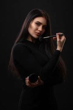 Makeup. Applying Make-up Cosmetics Brush. Perfect Make-up. Stock Photos