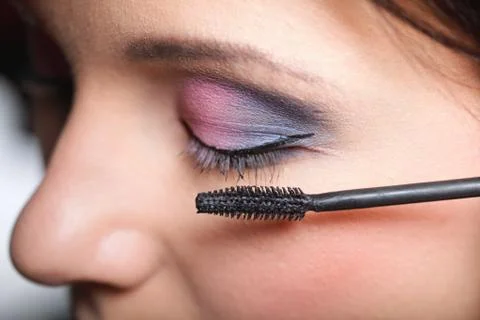 Makeup. applying mascara. long eyelashes Stock Photos