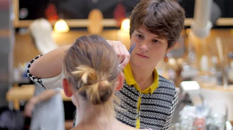 Makeup artist and model talking and smiling closeup Stock Footage 59727976