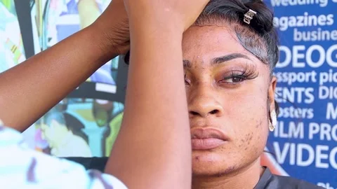 Makeup artist applying blusher on face of a model. woman applying blush  Stock Footage 224170755