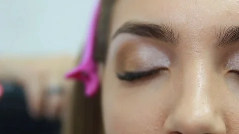 Makeup artist applying eyeshadow. Stock Footage 81572248