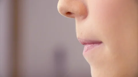 The makeup artist applying lip gloss Stock Footage 88712270